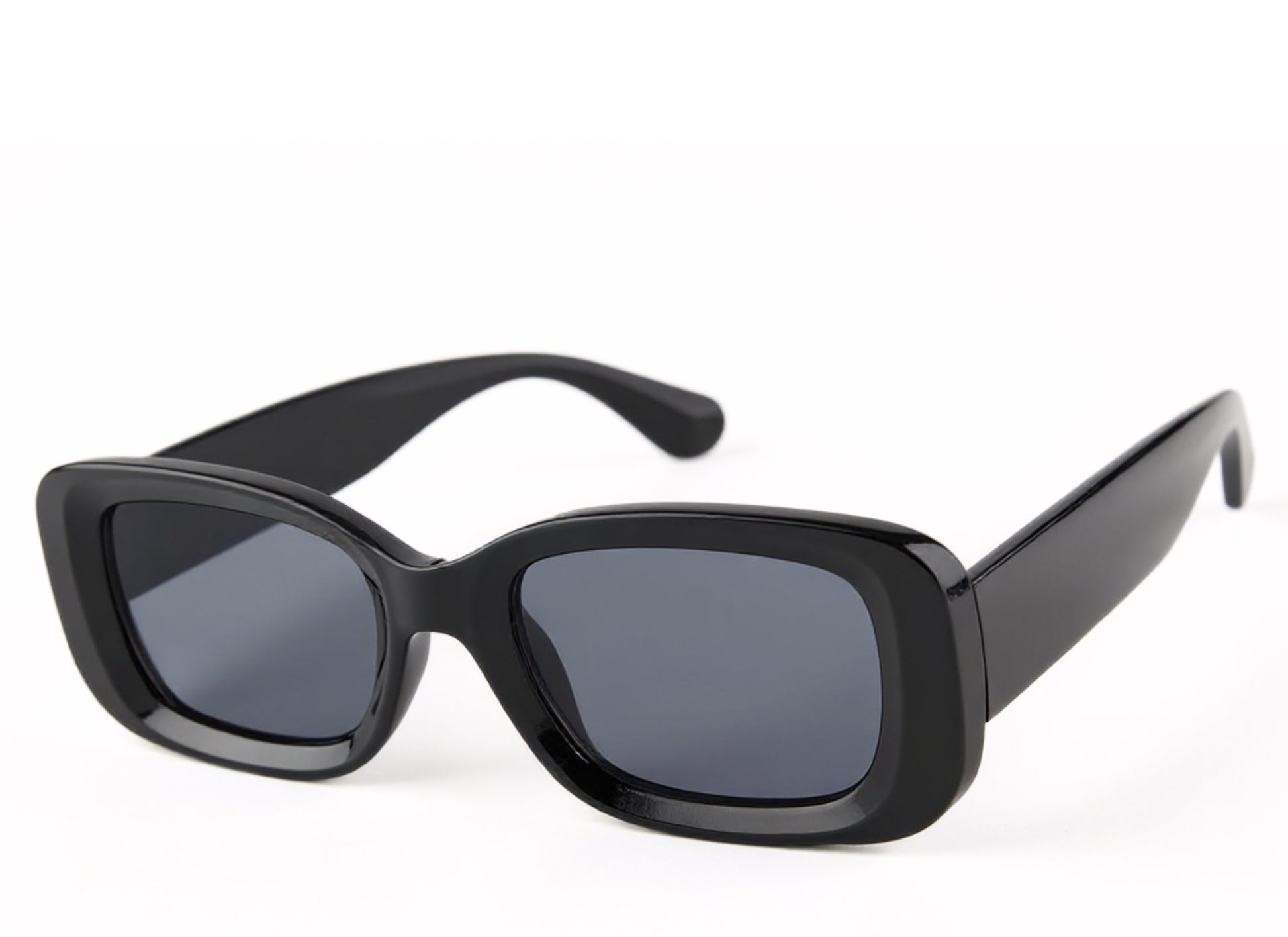 A bold black square frame that commands attention while staying effortlessly chic.